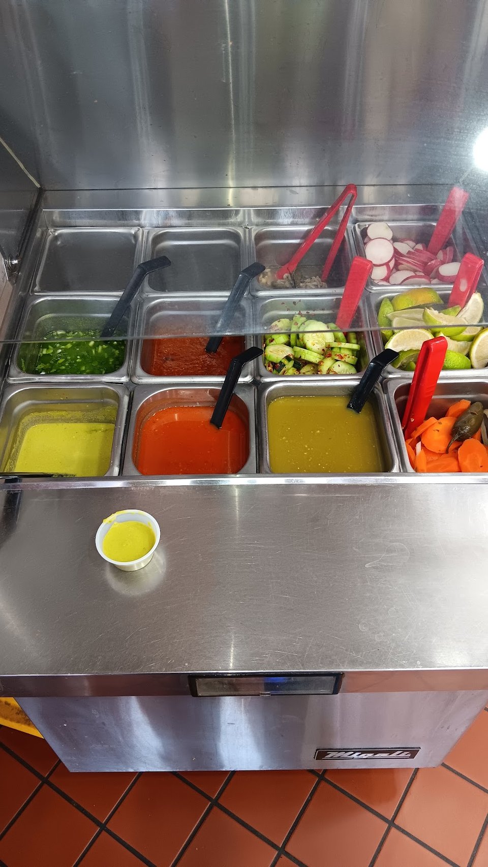 Counter menu showing combos, sides, and drinks.