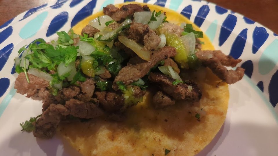 Mexican menu with tacos, tostadas, and taquitos.
