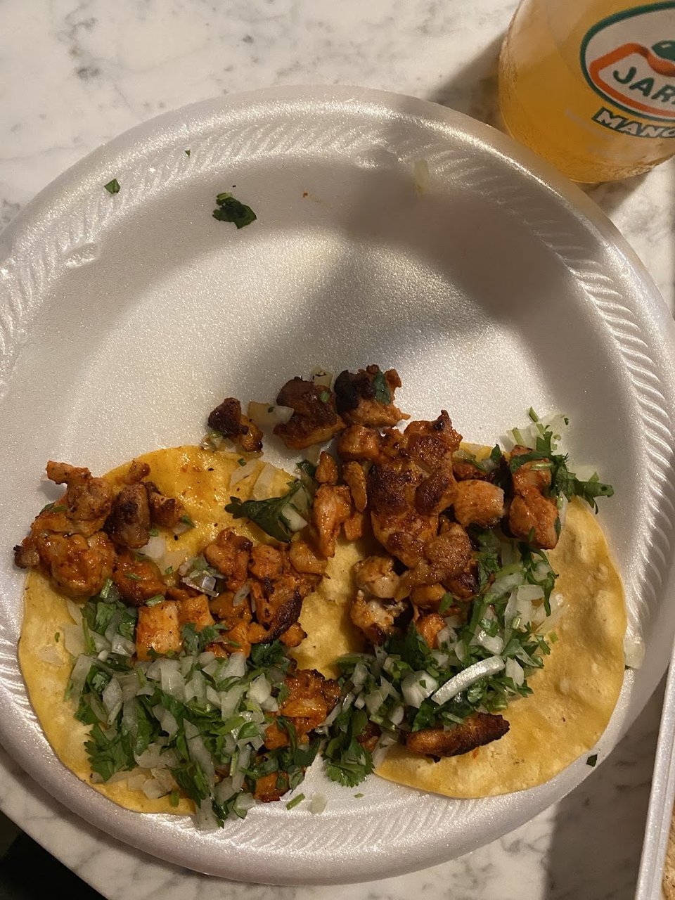 Mexican menu with tacos, tostadas, and taquitos.